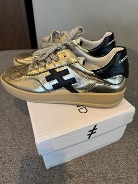 NWT Another Trend Gold Metallic Sneakers with Black Accent